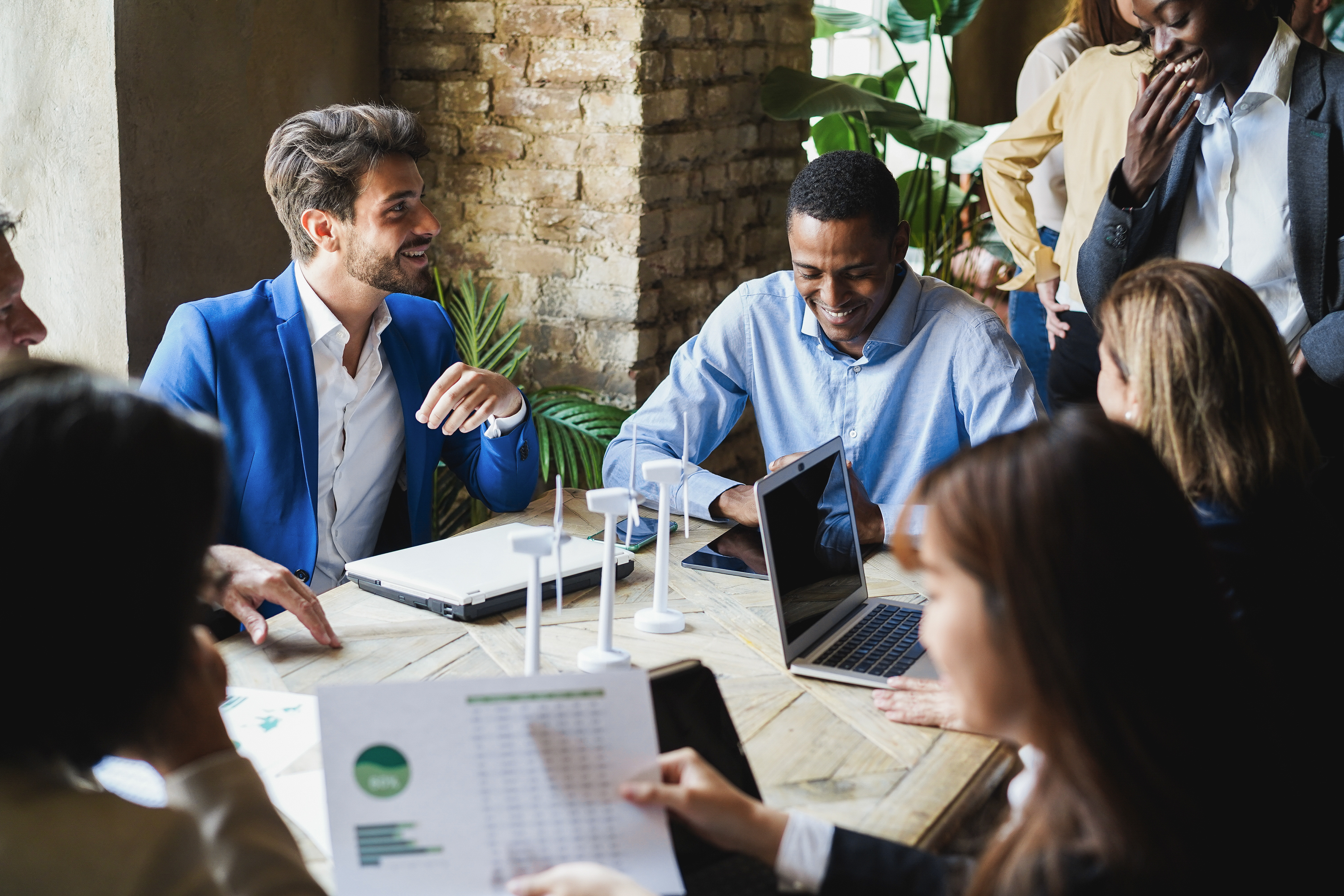 MBA students chat around a table