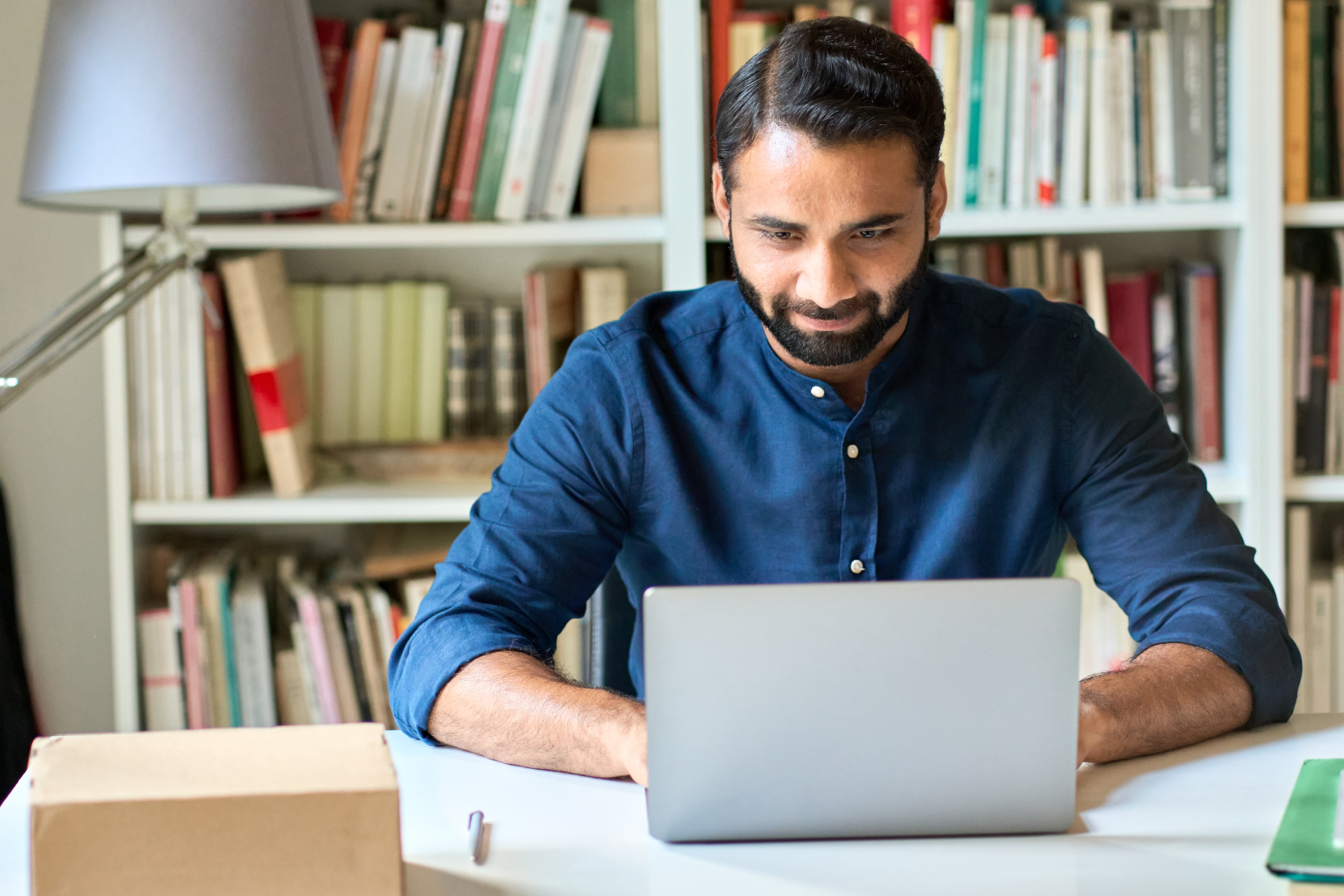 Indian MBA student on laptop