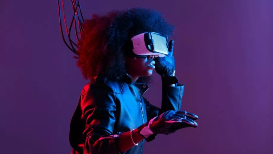 Woman wears an AI headset against purple background