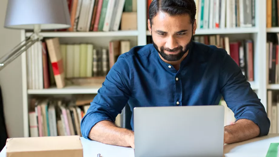 Indian MBA student on laptop