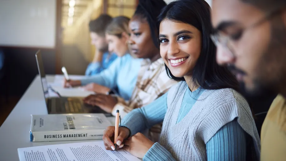Business students working at desk