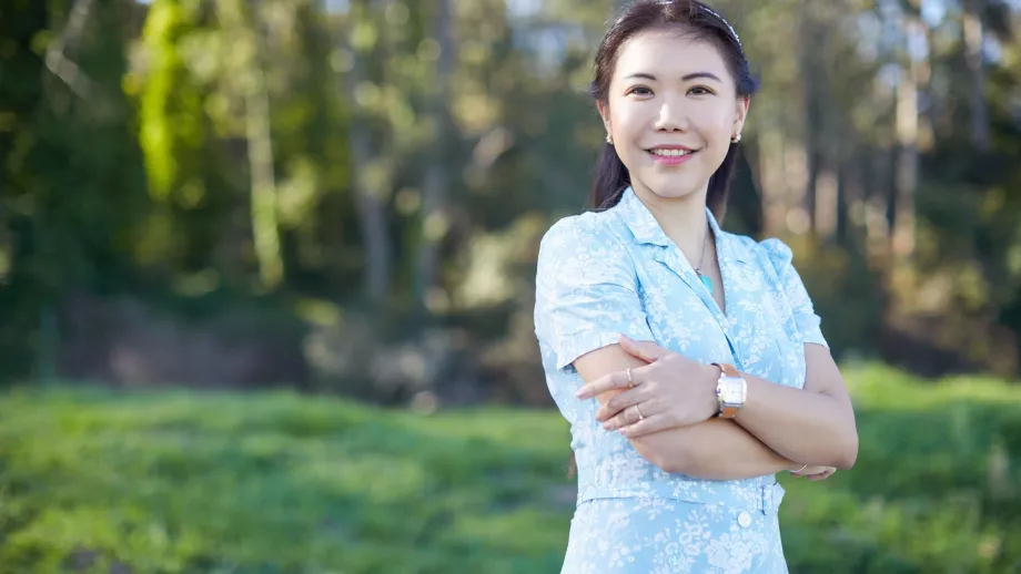 A picture of Val Yap surrounded by trees